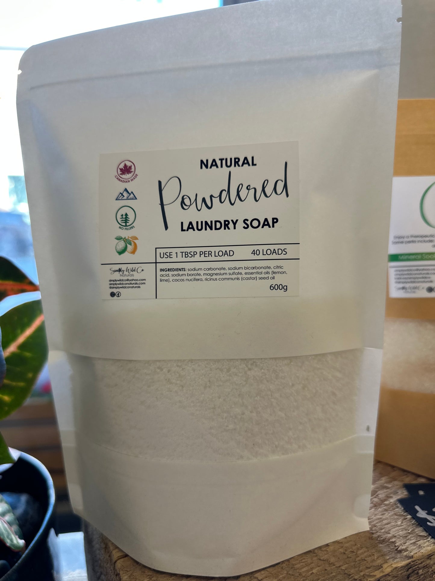 Bag of natural powdered laundry detergent made in Canada with lemon and lime essential oils