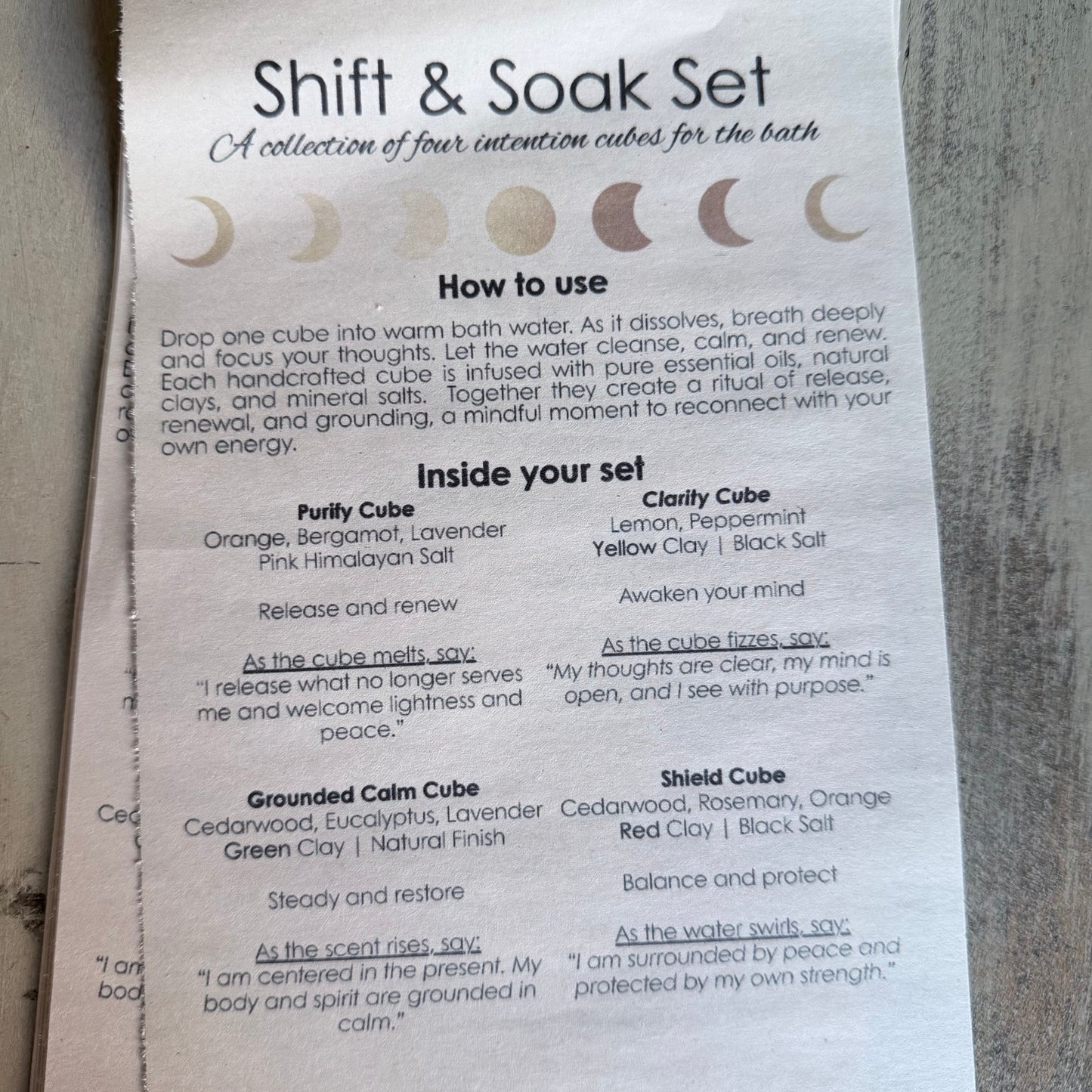 Sheet of paper with instructions for a 'Shift & Soak Set' on a stone surface.