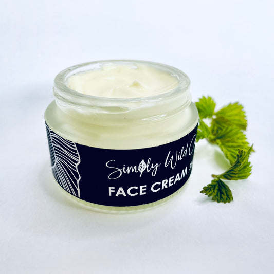 natural face cream and rose leaf